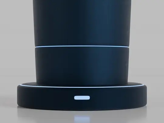 The Quantum Bottle seated on its magnetic Qu Coaster with the base ring lit